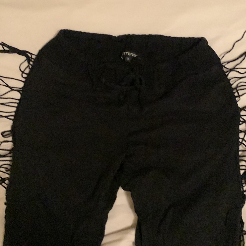 Kittenish fringe joggers